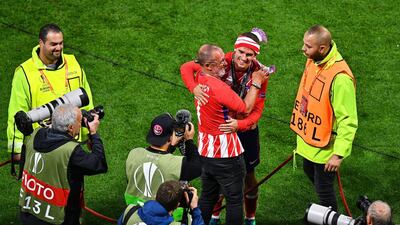 Atletico Madrid's Antoine Griezmann, centre right, celebrates with his father Alain after the UEFA Europa League final between Olympique Marseille and Atletico Madrid in Lyon, France, on May 16, 2018. Sascha Steinbach / EPA