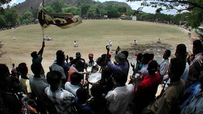 Local supporters play music and wave the Sri Lankan flag as the England cricket team field, during the one-day match at the Welagedara Stadium, Kurungala, in Sri Lanka. Getty Images