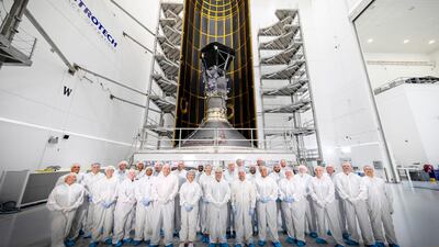 A photo made available by NASA shows the team behind the Parker Solar Probe (PSP) posing for a group photo in front of the probe, at Astrotech Space Operations. EPA/NASA
