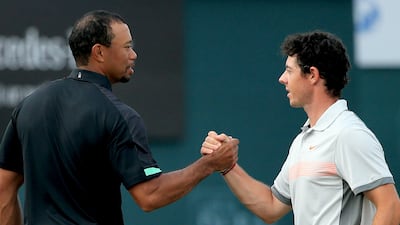Rory McIlroy with Tiger Woods during the 2014 Omega Dubai Desert Classic. Getty Images