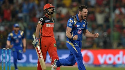 Mitchell McClenaghan’s early dismissal of Virat Kohli put Bangalore under pressure as Mumbai Indians limited the home team to a total they chased down with eight balls to spare. Manjunath Kiran / AFP