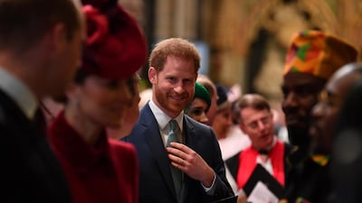 Prince Harry, Duke of Sussex is introduced to performers as he leaves after attending the Commonwealth Day Service. Getty Images