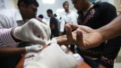 Workers who took advantage of the free medical camps had a variety of ailments from fevers to back pain.