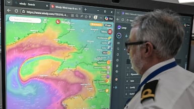 An officer at the Falmouth Maritime Rescue Co-ordination Centre, in Cornwall, south-west England, monitors Storm Goretti. Getty Images