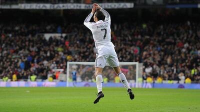 Cristiano Ronaldo of Real Madrid celebrates after scoring Real's second goal during their La Liga victory on Saturday. Denis Doyle / Getty Images