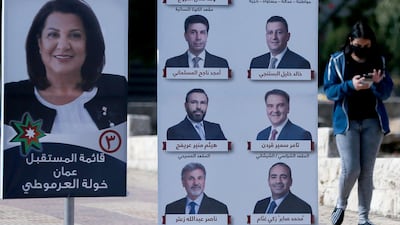 Campaign posters of candidates for the upcoming Jordanian parliamentary elections line a street in the capital Amman. AFP
