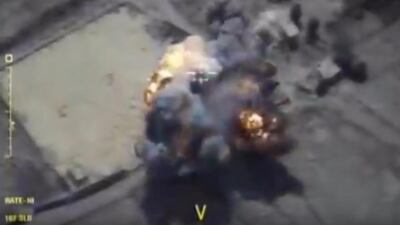 This frame grab provided on September 26, 2017 by the Russian Defence Ministry press service shows militants' positions being hit in the Idlib province of Syria as a result of air strikes conducted by Russians. The Associated Press