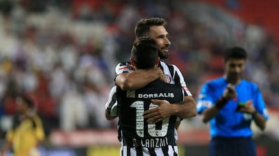 Mirko Vucinic and Manuel Lanzini (No.10) celebrate after combining for Al Jazira’s first goal. Ravindranath K / The National