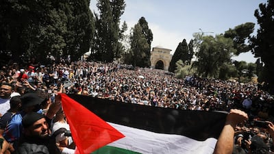 Palestinians gather after performing the last Friday prayers of Ramadan to protest over the possible eviction of several Palestinian families from homes on land claimed by Jewish settlers in the Sheikh Jarrah neighbourhood, in Jerusalem's Old City. Reuters