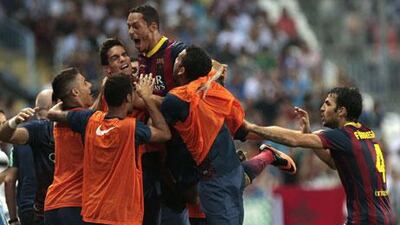 Ardriano celebrates with Barcelona after scoring the winner against Malaga. Jorge Zapata / EPA