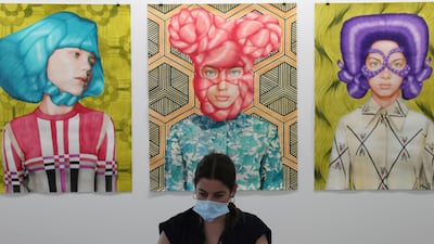 Paintings by Angeles Agrela at Art Dubai at Dubai International Financial Centre, which featured 50 galleries with a focus on modern and contemporary art. Kamran Jebreili / AP