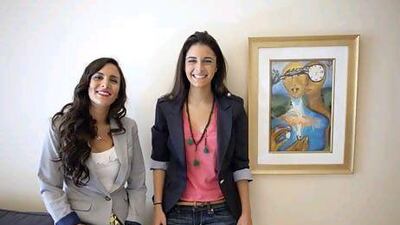 Rania Kana’an, right, and her sister Zaina founded ananasa.com with the aim of exposing Middle East art to the world. Jaime Puebla / The National