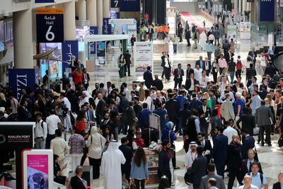 People arrive for the first day of Cityscape Global in Dubai. Chris Whiteoak / The National