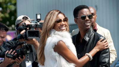 In Top Five, Chris Rock does triple duty as writer, director and actor. The film also stars Gabrielle Union, left, as his TV-star fiancee. Ali Paige Goldstein / AP Photo/Paramount Pictures