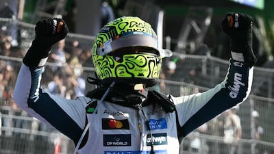 McLaren's British driver Lando Norris celebrates after winning the Mexico City Formula One Grand Prix at the Hermanos Rodriguez racetrack. AFP