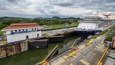 A ship navigates through the Miraflores locks, at the Panama Canal. The canal, which connects the Atlantic and Pacific oceans, has been struggling with water supply shortages due to lower rainfall. AFP