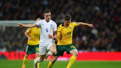 Jordan Henderson, left, in action during England's 4-0 Euro 2016 qualifier against Lithuania on March 27. Paul Gilham / Getty Images