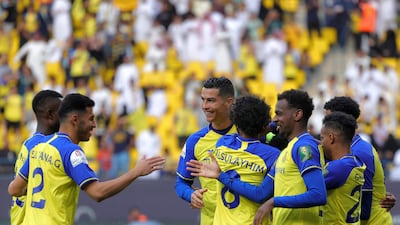 Ronaldo and teammates celebrate a goal. AFP