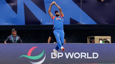 India's Mohd Siraj takes superb catch to dismiss United States batter Nitish Kumar. AP