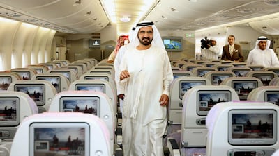 Sheikh Mohammad bin Rashid, Vice President and Ruler of Dubai, walking through an aisle of the second Emirates A380 superjumbo at Dubai International Airport in 2008. AFP
