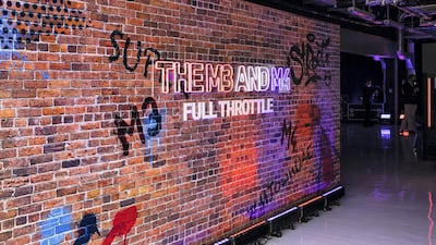 A decorated wall welcomes drivers to Yas.