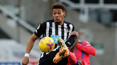 Newcastle United's Joelinton fights for the ball with Chelsea's N'Golo Kante at St James' Park. Reuters