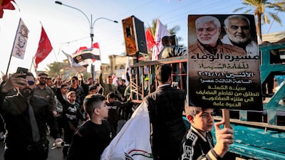 A march marking the anniversary of the killings of leaders of Iran's Islamic Revolutionary Guard Corps' Quds Force near Baghdad in 2020. AFP