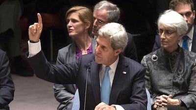US Secretary of State John Kerry votes with the other members of the United Nations Security Council to unanimously approve a resolution eradicating Syria's chemical arsenal. Reuters