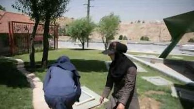 Female gardeners work outside Tehran's first women-only park.