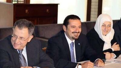 Saad Hariri, Lebanon's prime minister, centre, met Fouad Siniora, the former prime minister, and Bahia Hariri, an MP, in Beirut yesterday.