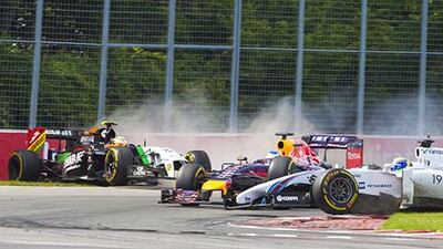 Felipe Massa of Williams crashes with Sergio Perez of Force India during the last lap at the Gilles Villeneuve circuit in Montreal. Andre Pichette/ EPA