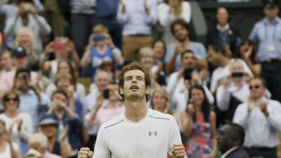 Andy Murray of Britain gestures after defeating Vasek Pospisil of Canada, after winning their men's quarter-final singles match at the All England Club in Wimbledon, London, Wednesday July 8, 2015. Murray won 6-4, 7-5, 6-4. (AP Photo/Kirsty Wigglesworth)