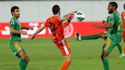 Essa Obaid, left, nearly put Al Shabab ahead as early as in the seventh minute last night. Satish Kumar / The National