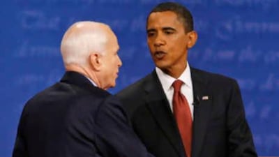 Barack Obama, right, and John McCain shake hands following their presidential debate at the University of Mississippi, on Sept 26, 2008.