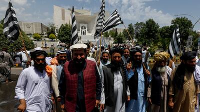Pro-government demonstrators gather in front of the Supreme Court to protest against the granting of bail to Imran Khan in Islamabad, Pakistan. Reuters