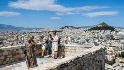 Tourists at the Acropolis in Athens. Greece would welcome visitors with proof of inoculation. Getty Images