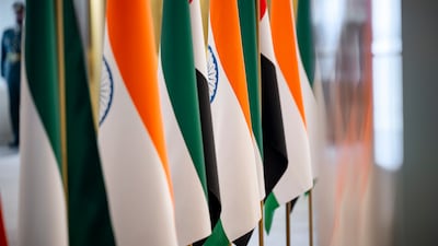 The UAE and Indian flags during the arrival of Indian Prime Minister Narendra Modi in Abu Dhabi in May. UAE Presidential Court