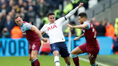 West Ham United's Mark Noble and Ryan Fredericks in action with Tottenham Hotspur's Dele Alli. Reuters