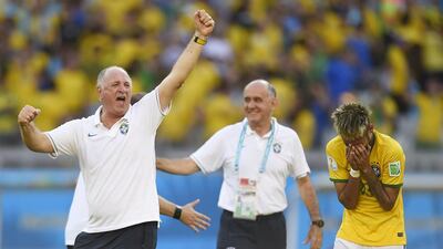 Brazil forward Neymar reacts next to Brazil coach Luiz Felipe Scolari at the end of the penalty shootout and extra time in their last-16 match against Chile on Saturday at the 2014 World Cup in Belo Horizonte, Brazil. Fabrice Coffrini / AFP