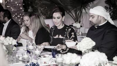 At a recent high-society gathering put together by Club Uno Dubai, 24 people with fashion industry influence gathered in the designer Nadine Kanso’s Jumeirah Beach Road garden for an exclusive dinner. Courtesy Club Uni Di Peroni