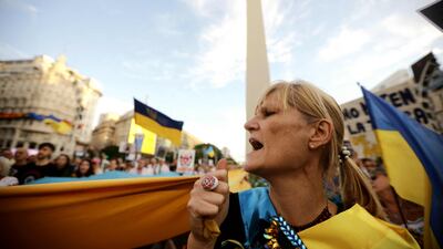 Pro-Ukraine demonstrators take part in a rally commemorating the second anniversary of the Russian invasion of Ukraine at the Obelisk in Buenos Aires. AFP