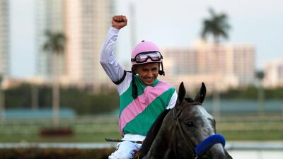 Mike Smith atop Arrogate celebrates after winning the Pegasus World Cup on January 28, 2017 in Hallandale, Florida. Mike Ehrmann / Getty Images