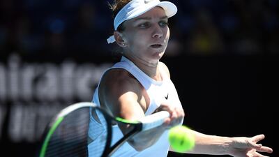 Romania's Simona Halep hits a return against Kazakhstan's Yulia Putintseva during their women's singles match at the Australian Open. AFP