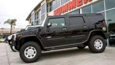 Hummers on the lot at Tustin Hummer, a dealership in Tustin, California on June 1, 2009. General Motors Corp. said Tuesday that it has tentatively agreed to sell its Hummer brand.