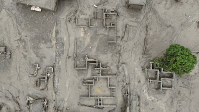 A drone view shows mud covering buildings following a flash flood in Trishuli, Nuwakot district, Nepal. Reuters