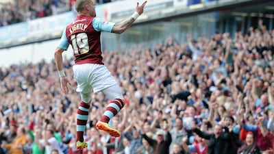 Michael Kightly of Burnley celebrates scoring their second goal during the Sky Bet Championship match between Burnley and Wigan Athletic at Turf Moor on April 21, 2014 in Burnley, England. Chris Brunskill / Getty Images