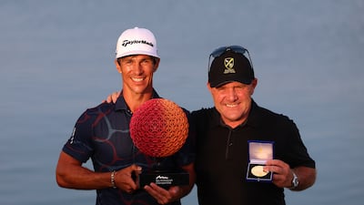 Thorbjorn Olesen of Denmark and his Caddie Dominic Bott celebrate victory. Getty Images