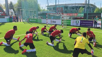 Team Egypt warm up before a game at the Street Child World Cup in Russia. Photo: Team Egypt