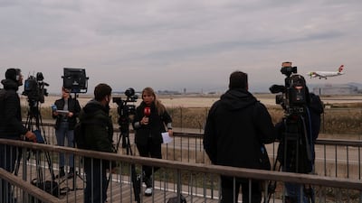 Journalists at Barcelona's El Prat airport after a plane flying from Morocco to Turkey made an emergency landing. Reuters