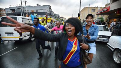 Joy after the final whistle as fans celebrate in the streets of Yeoville, Johannesburg. Photo: Bram Lammers